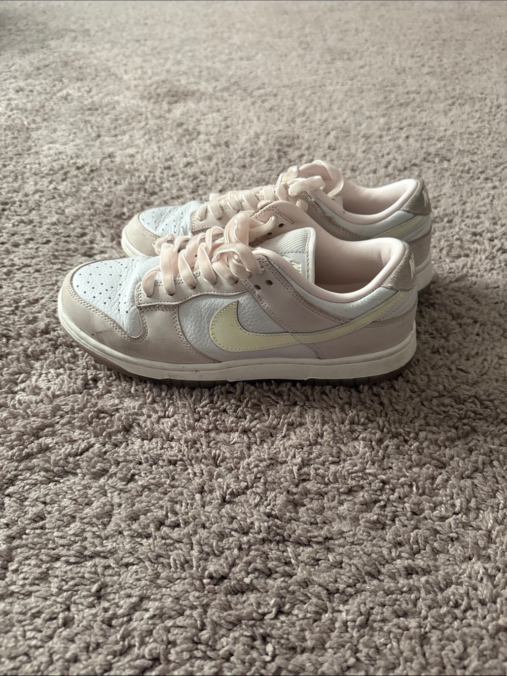 Nike Women's Pastel Pink Low-Top Sneakers with Cream Swoosh